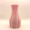 Un vase aux courbes tendres, avec verre intérieur, pour sublimer vos fleurs et illuminer votre intérieur.